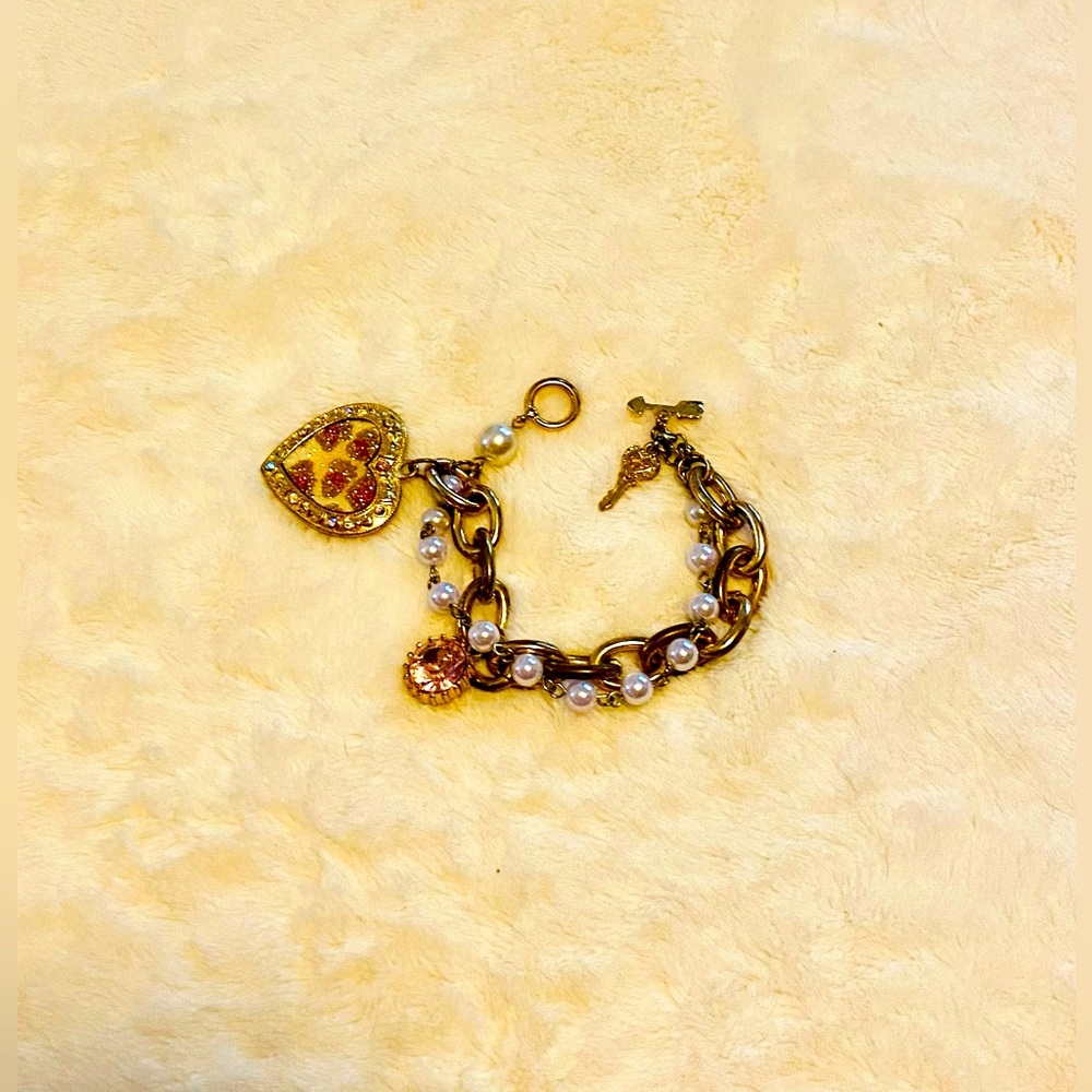 Betsey Johnson double bracelet. Gold tone & faux pearl with charms. One size.